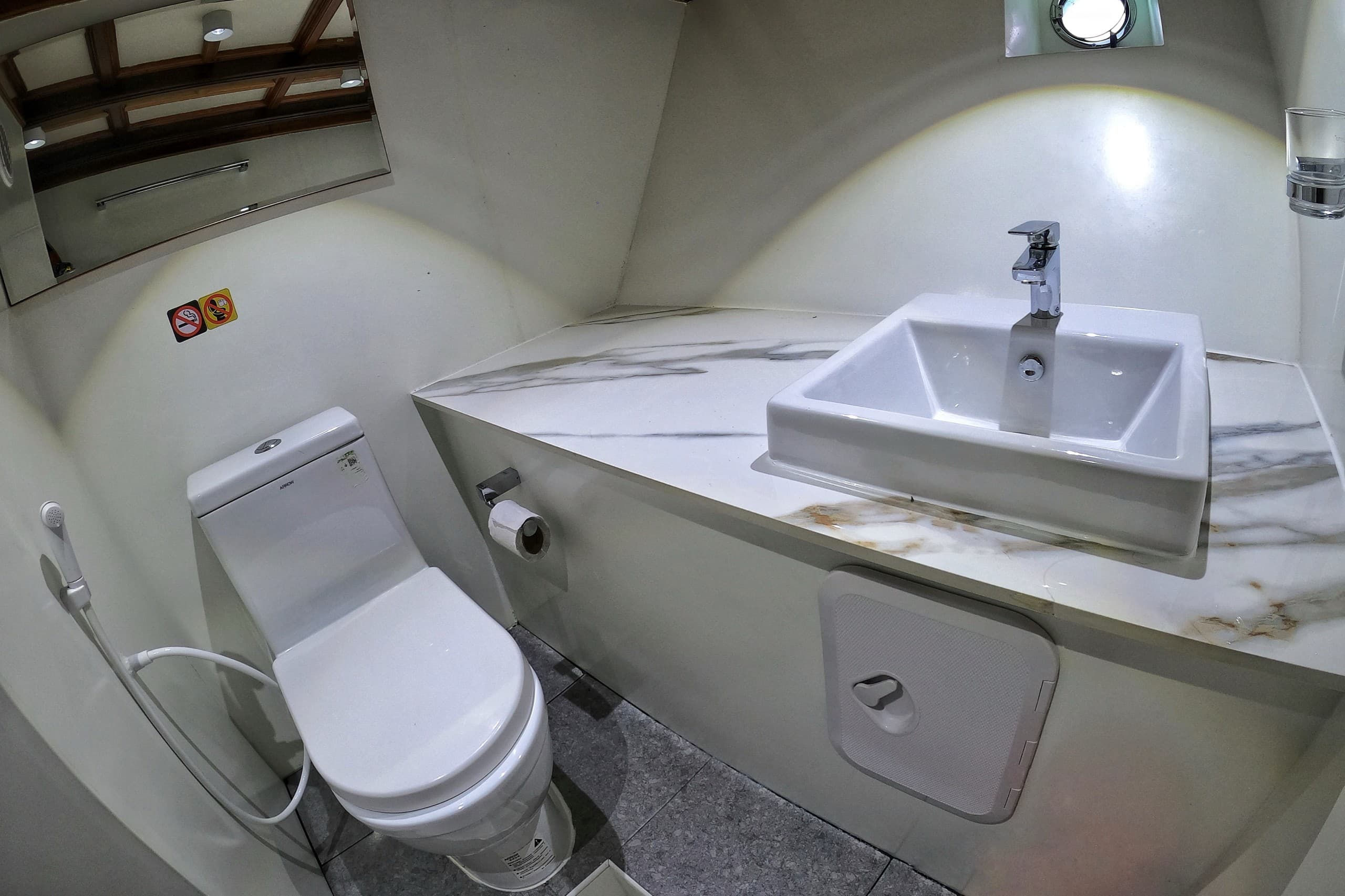Private bathroom inside a cabin on Maavahi liveaboard in the Maldives