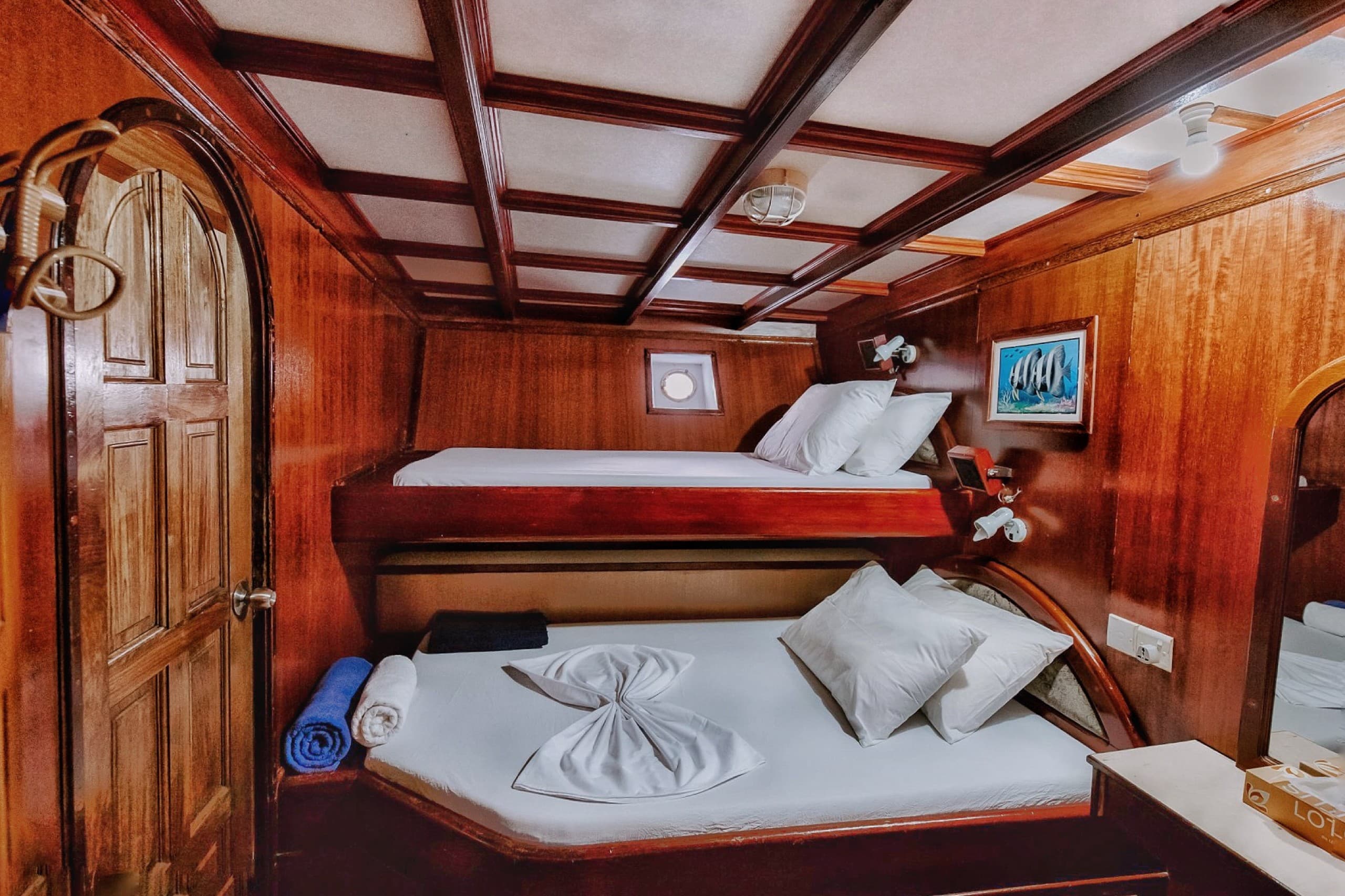 Bunk bed cabin on Maavahi liveaboard surf boat in the Maldives