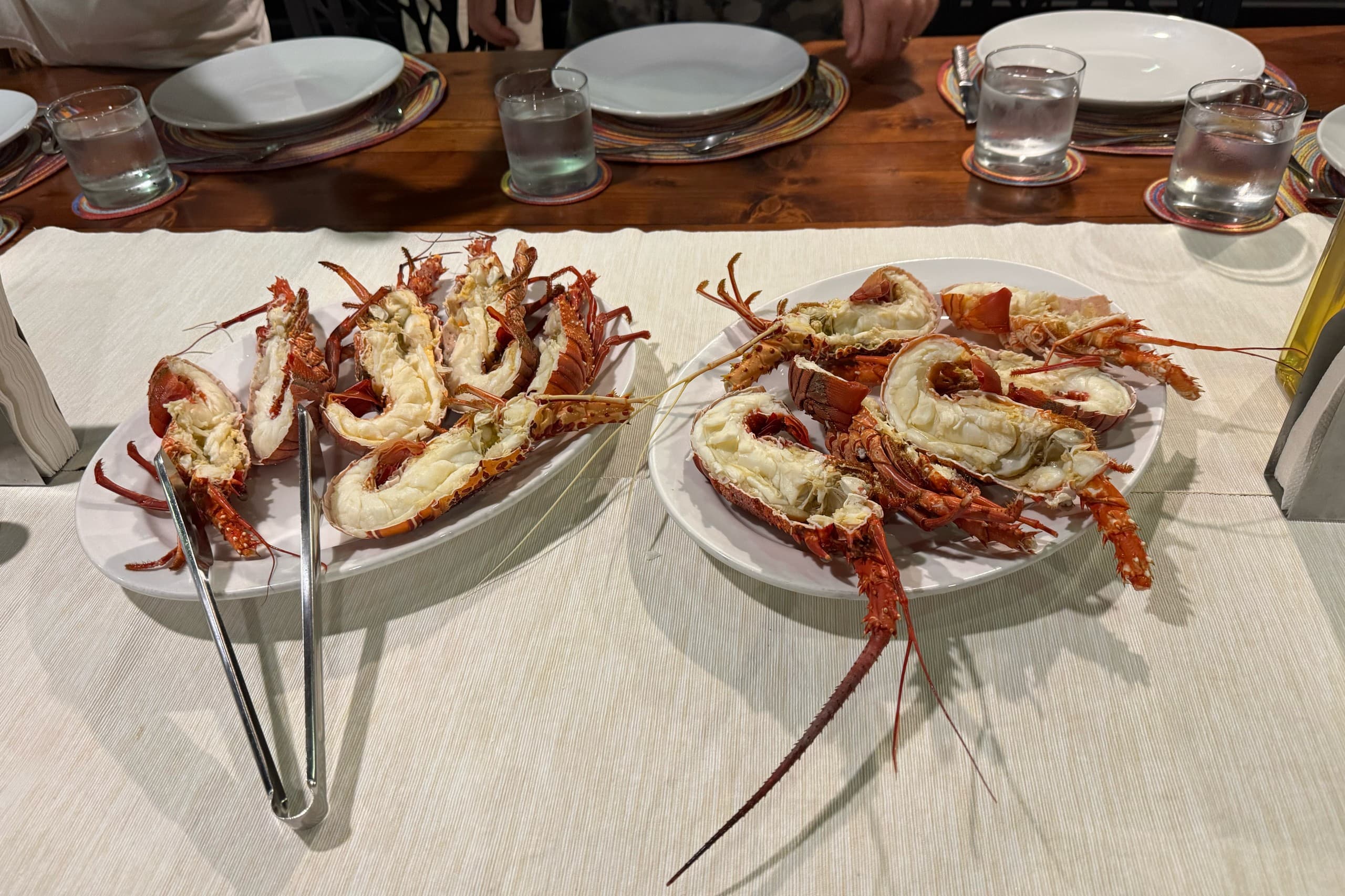 Fresh lobster served on table during liveaboard dinner experience in Maldives