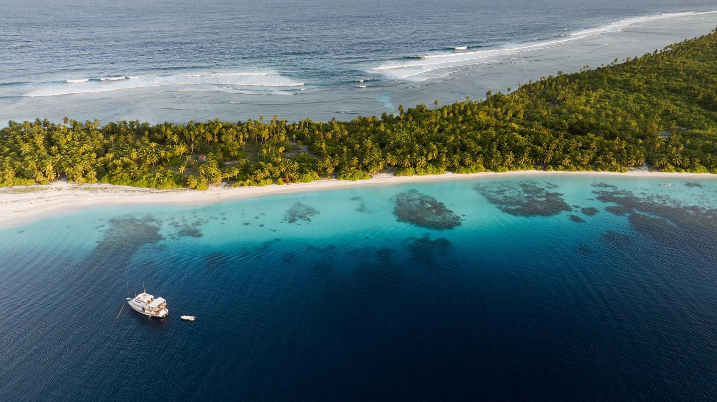 Aerial view of a lagoon and Maavahi charters
