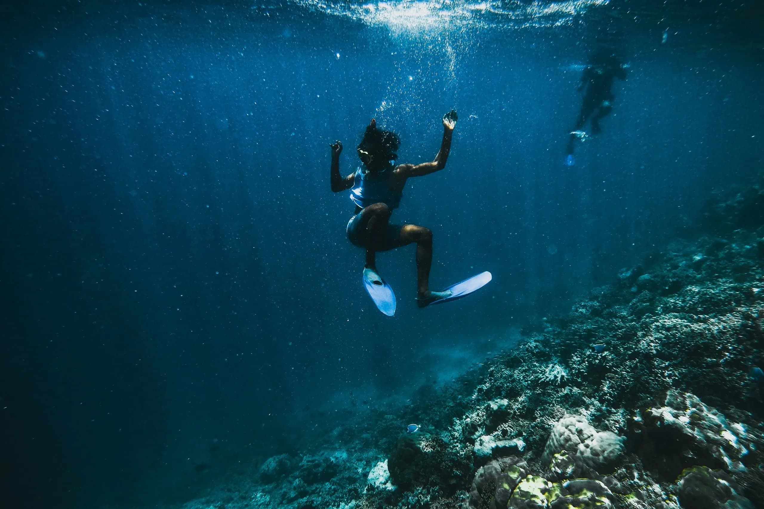 Snorkeling over a coral reef in the Maldives